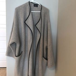 Wool warm Cardigan. Body length.